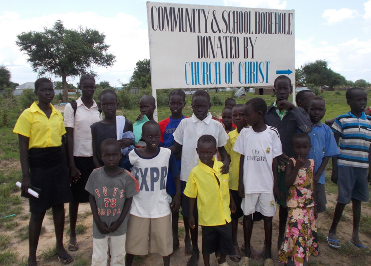 Group With a Borehole Sign